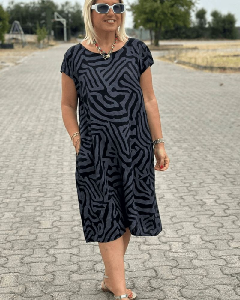 NELIA | Letnia sukienka z okrągłym dekoltem i pięknym nadrukiem